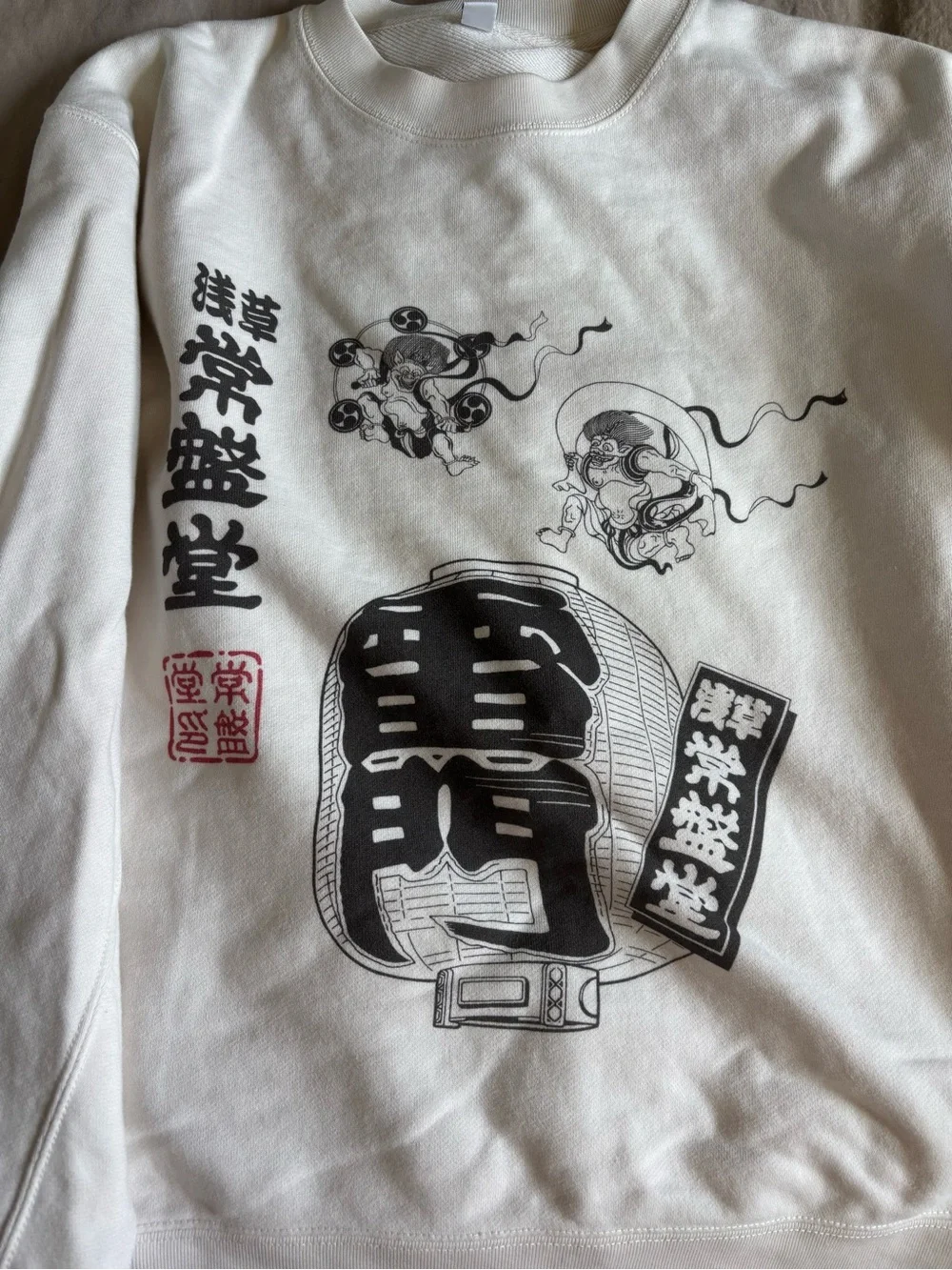 From Uniqlo Tokyo. Cream Graphic Crewneck Sweatshirt - Picture 6 of 6